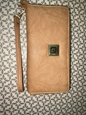 Stone Mountain Accessories brown faux leather wallet with gold logo plaque